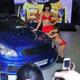 Illustration for article titled The Chinese Are Using Children In Bikinis To Show Off Cars